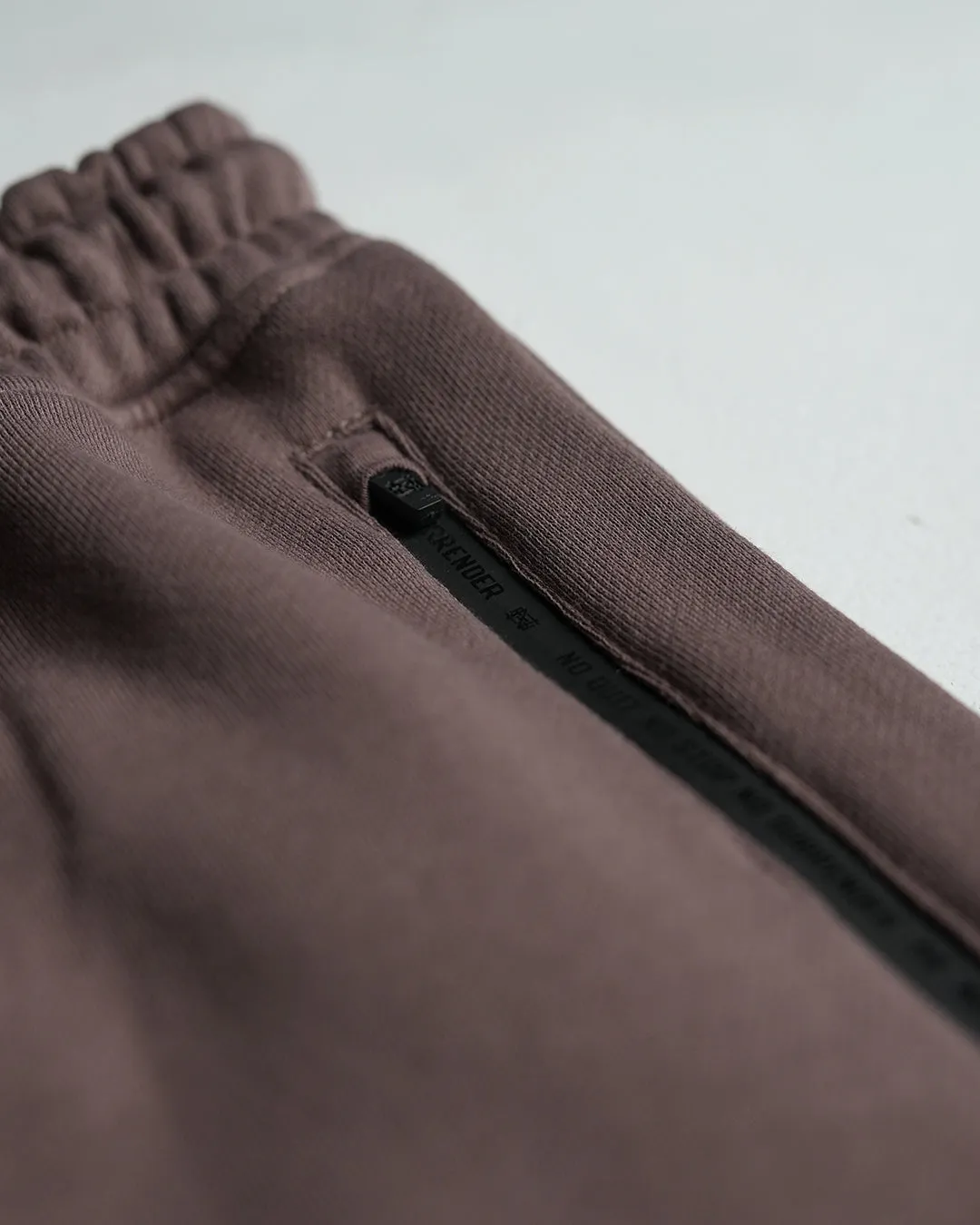 EMBOSSED FITTED JOGGERS-EARTH